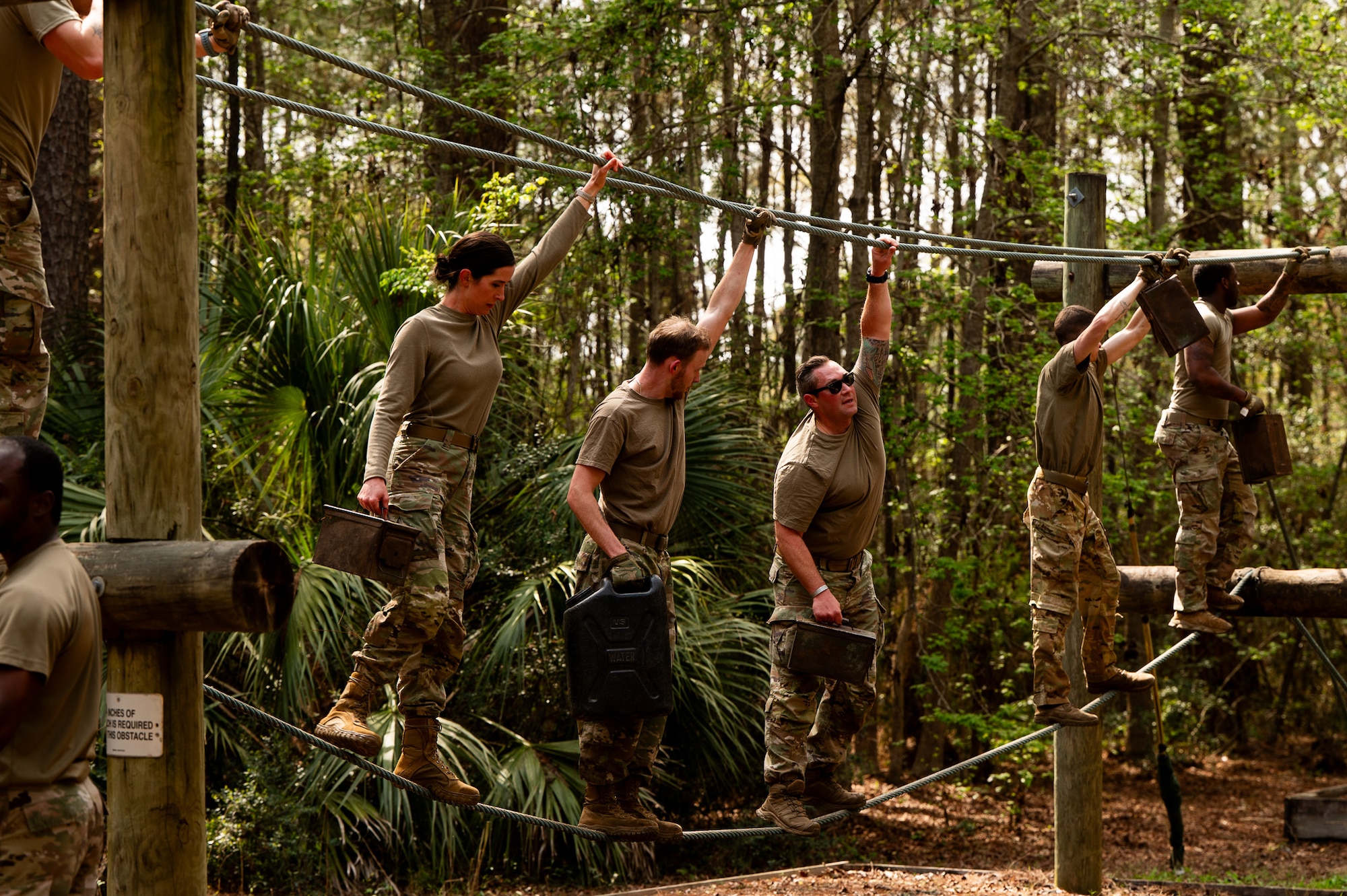 Airman Leadership School instructors participate in the endurance obstacle course during the ALS field training exercise at the Marine Corps Recruiting Depot, Parris Island, South Carolina.