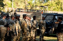 U.S. Marine Corps Cpl. Johny Escamilla, Field Training Company weapons and Field Training Battalion warrior instructor, gives a pre-brief during a joint Airmen Leadership School field training exercise at the Marine Corps Recruiting Depot, Parris Island, South Carolina.