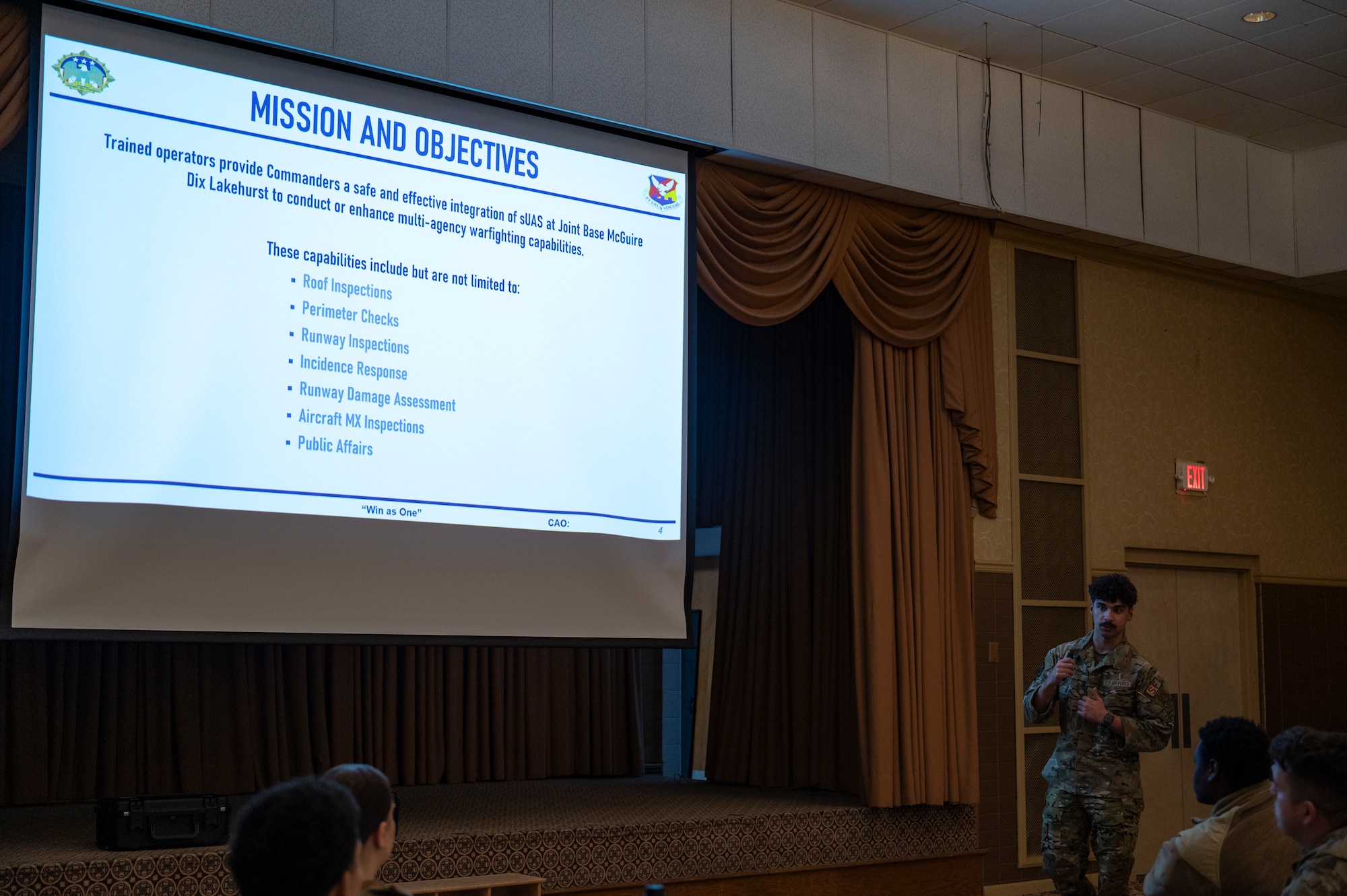 U.S. Air Force Senior Airman Jacob Bilyou, 723rd Combat Air Base Squadron security forces defender, instructs Airmen assigned to the 723rd CABS on small Unmanned Aircraft Systems (sUAS) at Joint Base McGuire-Dix-Lakehurst, N.J., Feb. 3, 2026.
