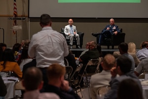 An attendee asks a question to U.S. Air Force Col. Matthew Norton, 17th Training Wing commander and J.R. Orlando, 17 TRW public affairs chief, during the San Angelo Chamber of Commerce Goodfellow update luncheon at the McNease Convention Center, San Angelo, Texas, March 24, 2026. The event provided an opportunity for community members and Goodfellow Air Force Base leadership to engage and discuss the installation’s mission and future. (U.S. Air Force photo by Senior Airman James Salellas)