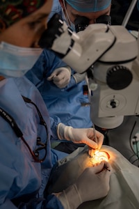 U.S. Air Force Lt. Col. Jessica Bolton, 96th Medical Group ophthalmologist, performs cataract surgery at the Georgetown Public Hospital Corporation in Georgetown, Guyana, March 17, 2026. During the Lesser Antilles Medical Assistance Team (LAMAT) 2026 mission, the Guyana Ministry of Health identified priority specialties based on national needs, enabling U.S. Air Force ophthalmology teams to sharpen clinical readiness while working alongside local providers to strengthen lasting partnerships. (U.S. Air Force photo by Maj. Stephani Schafer)