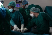 U.S. Air Force Staff Sgt. Jazmin Smith, an orthopedic technician assigned to Wright-Patterson Air Force Base Hospital, assists during surgery on a Tanzanian patient during a medical readiness exercise as part of Justified Accord 26 at Lugalo General Military Hospital in Dar es Salaam, Tanzania, March 9, 2026.
