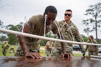 Private 2nd Class Shane Rogers, an air defense battle management system operator with the 116th Field Artillery, participates in an oleoresin capsicum (OC) certification event at Camp Blanding Joint Training Center, Fla., March 25, 2026