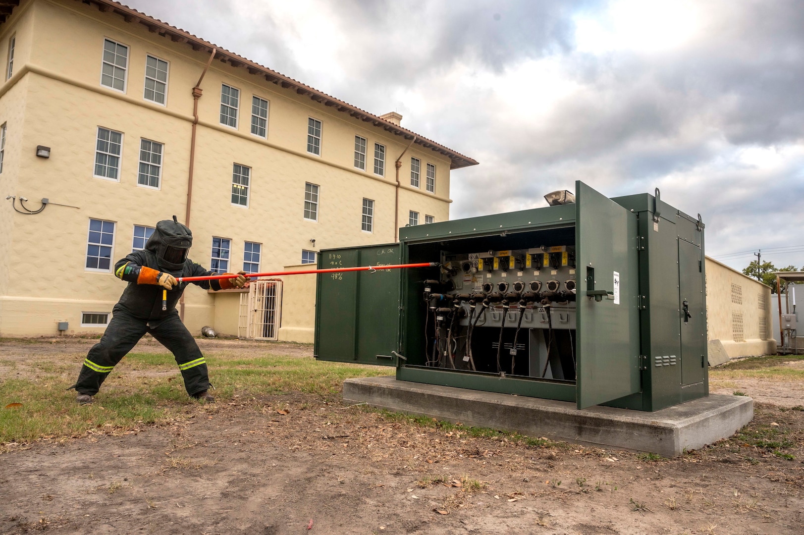 A CPS Energy technician shuts down power to an office building for the exercise at Joint Base San Antonio-Fort Sam Houston on March 26, 2026. The power outage exercise was to help JBSA installations prepare for real-word scenarios. (U.S. Air Force photo by Melissa Hydrick)