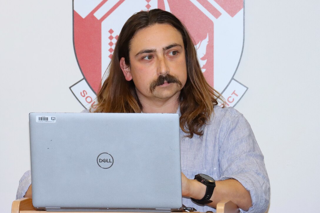 Grant Adams, an emergency management planner, presents training scenarios during a continuity of operations exercise March 17 at the LA District’s area office in Phoenix.