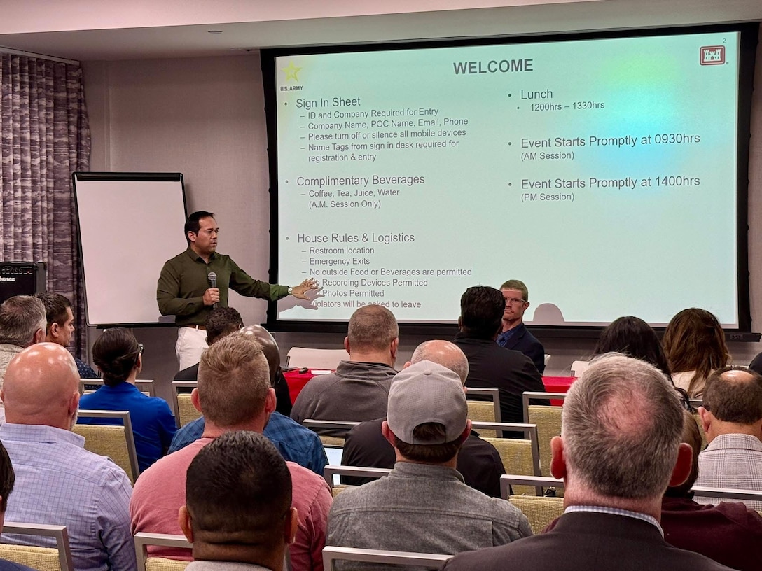 Sean Sackett, chief of the U.S. Army Corps of Engineers Los Angeles District Contracting Division, left, addresses attendees March 5 during an Industry Day in Las Vegas focused on contracting opportunities for upcoming projects at Nellis Air Force Base, Nevada.