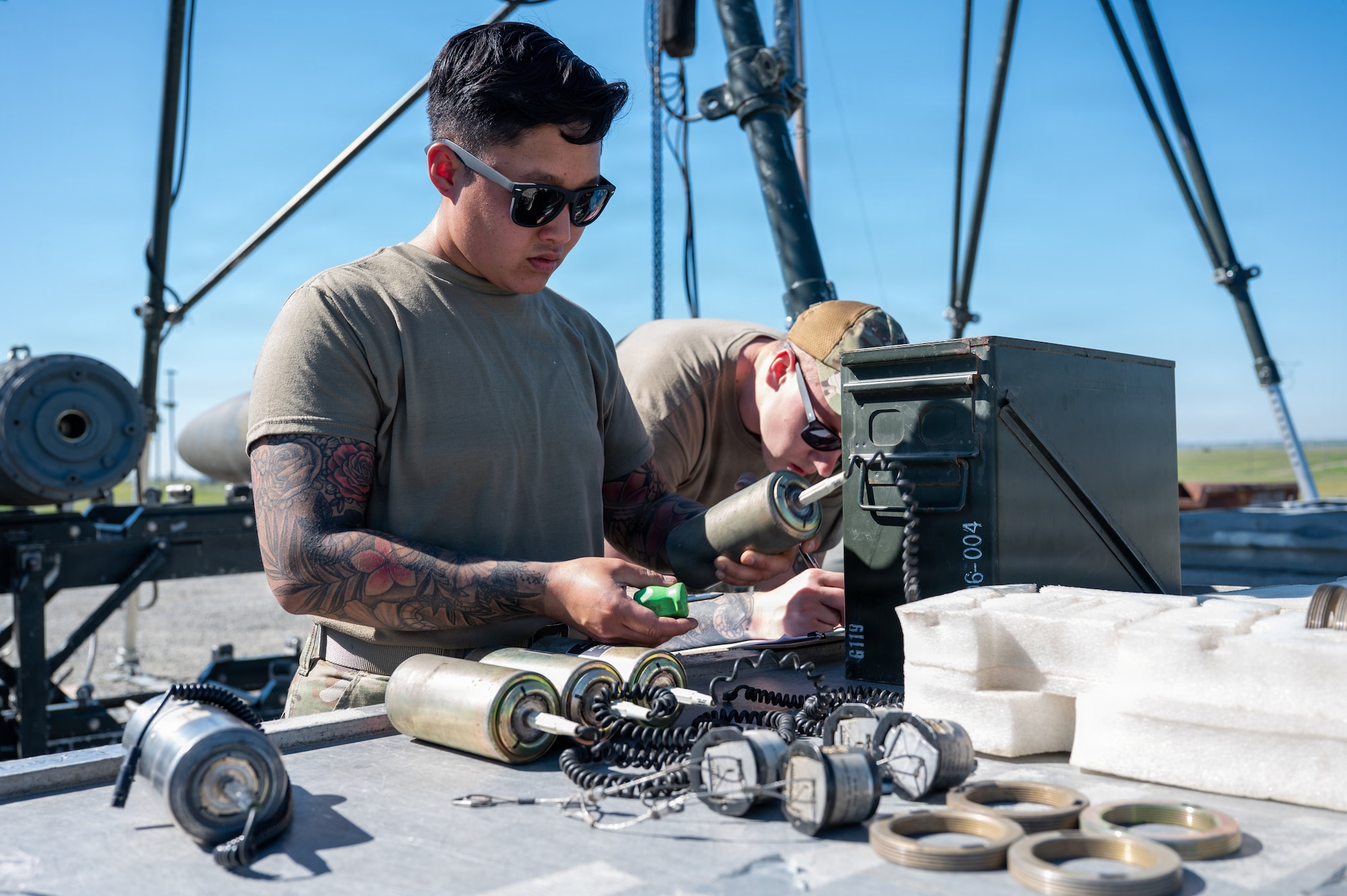 Airmen assembled live munitions to meet 24-hour sortie requirements while testing planning, assembly and movement skills. With its first class held in 1986, AFCOMAC celebrated its 40th anniversary with the graduation of class 2026-004. (U.S. Air Force photo by Airman 1st Class Ty'Jaih Wallace)