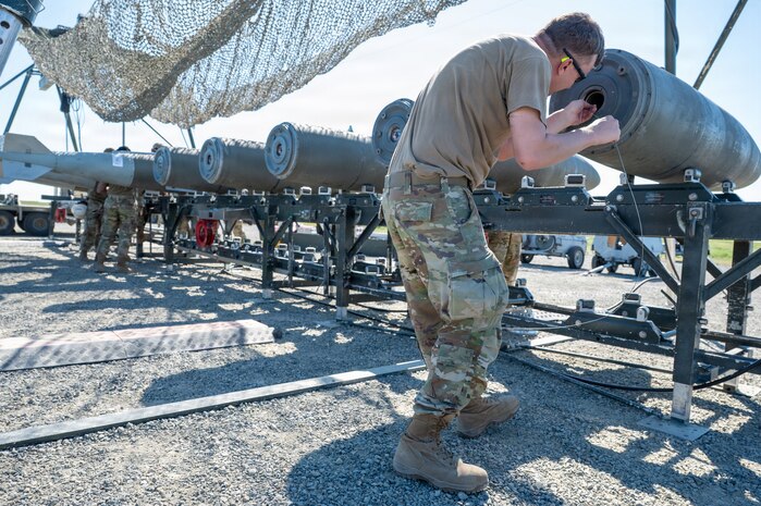 Airmen built live munitions for 24-hour sortie requirements while refining planning, assembly and movement skills. With its first class held in 1986, AFCOMAC celebrated its 40th anniversary with the graduation of class 2026-004. (U.S. Air Force photo by Airman 1st Class Ty'Jaih Wallace)