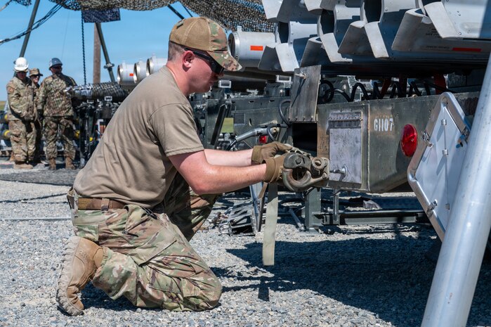 Airmen built live munitions for 24-hour sortie requirements while refining planning, assembly and movement skills. With its first class held in 1986, AFCOMAC celebrated its 40th anniversary with the graduation of class 2026-004. (U.S. Air Force photo by Airman 1st Class Ty'Jaih Wallace)