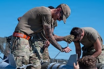 Airmen prepared live munitions to support 24-hour sortie requirements while strengthening mission-critical skills. With its first class held in 1986, Air Force Combat Ammunition Center celebrated its 40th anniversary with the graduation of class 2026-004. (U.S. Air Force photo by Airman 1st Class Ty'Jaih Wallace)