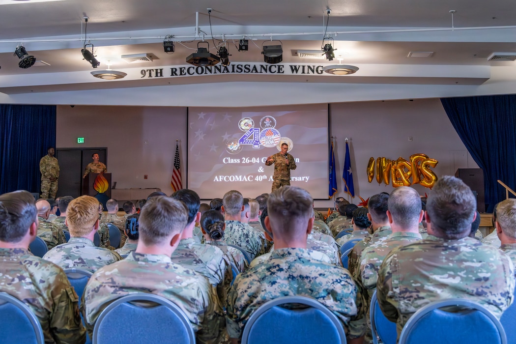 AFCOMAC provides advanced training in mass combat ammunition planning and production, preparing personnel to establish bomb dumps and build thousands of live munitions in realistic, bare-base scenarios through its Combat Ammunition and Production (CAPP) course and Senior Leader Aerial Munitions Course (SLAM-C). AFCOMAC courses are required for those in the munitions career field looking to complete their upgrade training to receive their 7- and 9- skill levels. AFCOMAC class 2026-004 consisted of a joint force featuring Airmen, Sailors and Marines. (U.S. Air Force photo by Senior Airman Frederick A. Brown)