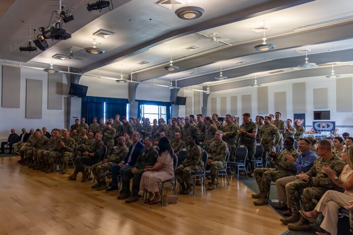 AFCOMAC class 2026-004 consisted of a joint force featuring Airmen, Sailors and Marines and broke the AFCOMAC record for the highest amount of munitions built, 915, along with the fewest discrepancies. AFCOMAC provides advanced training in mass combat ammunition planning and production, preparing personnel to establish bomb dumps and build thousands of live munitions in realistic, bare-base scenarios through its Combat Ammunition and Production (CAPP) course and Senior Leader Aerial Munitions Course (SLAM-C). (U.S. Air Force photo by Senior Airman Frederick A. Brown)