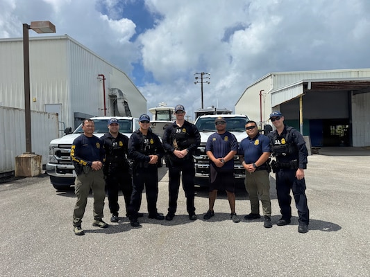 Members of the U.S. Coast Guard Sector Boarding Team stand for a photo with CNMI Customs and Biosecurity personnel on March 19, 2026, in Saipan.