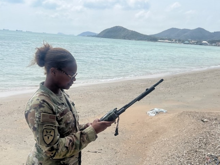 U.S. Air Force Staff Sgt. Mercedes Williams, 2nd Joint Communications Squadron, Joint Communications Support Element, tests radio equipment during an amphibious landing during Exercise Cobra Gold 2026 at Hat Yao Beach in Rayong province, Thailand, Feb. 26, 2026.