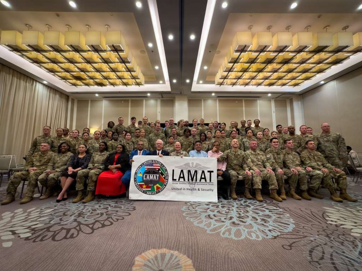 U.S. and Guyanese officials gather for a group photo following the opening ceremony for the 2026 Lesser Antilles Medical Assistance Team (LAMAT) mission in Georgetown, Guyana, March 16, 2026. Over the next two weeks, a multi-disciplinary team of U.S. Air Force medical personnel will integrate with local providers in medical facilities across Georgetown, Linden, and West Demerara. (U.S. Air Force photo by Master Sgt. Albert Rullan)