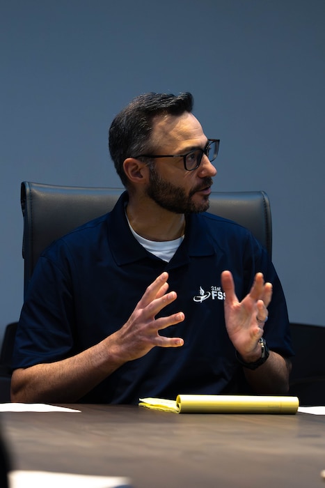 Matthew Albertson, 31st Force Support Squadron manpower and organization flight chief, talks about the duties and accomplishments of his flight during an evaluation of the 31st FSS at Aviano Air Base, Italy, March 25, 2026.