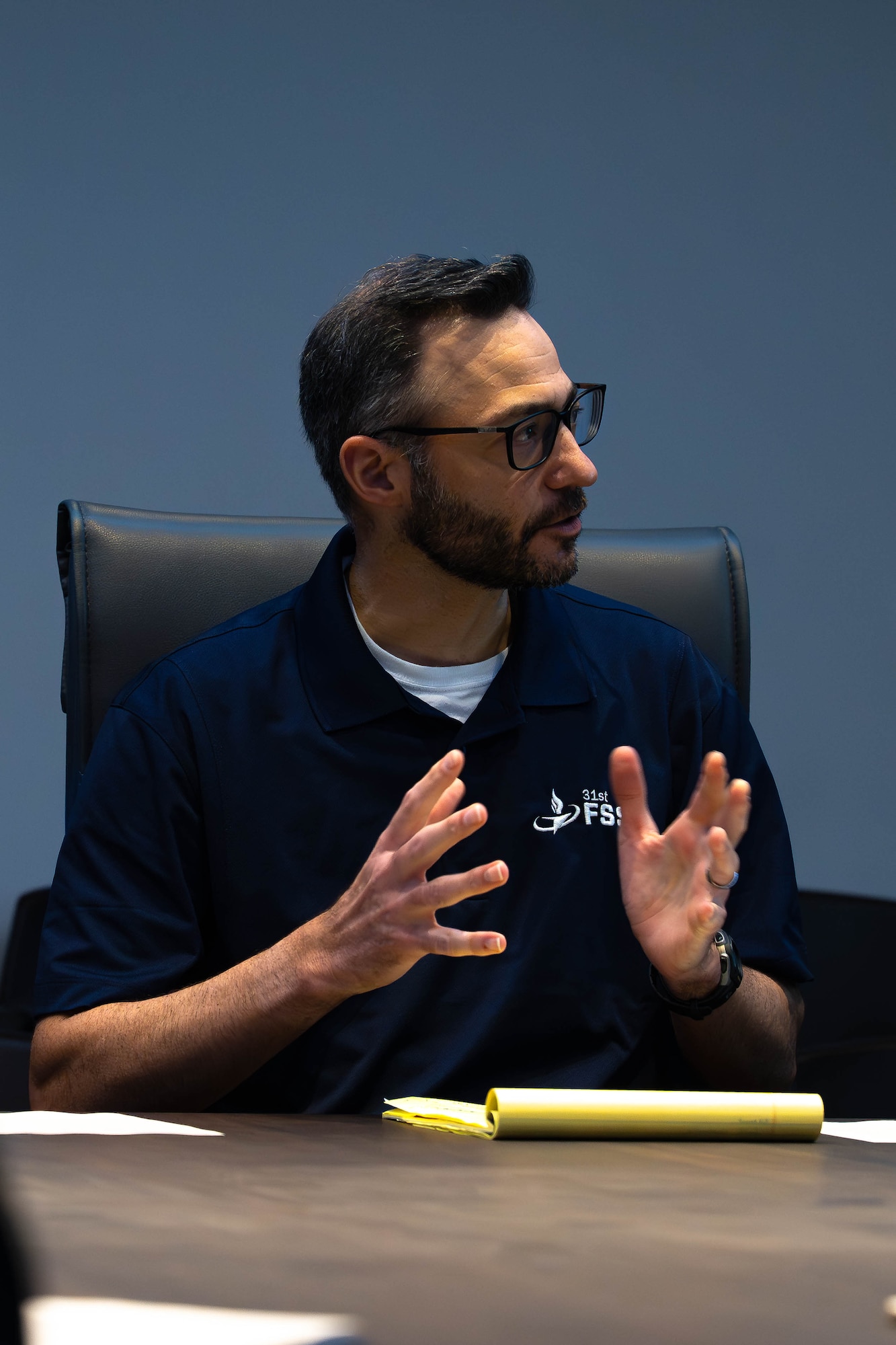 Matthew Albertson, 31st Force Support Squadron manpower and organization flight chief, talks about the duties and accomplishments of his flight during an evaluation of the 31st FSS at Aviano Air Base, Italy, March 25, 2026.