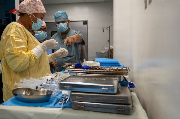 U.S. Air Force Tech. Sgt. Clark Galvez, 59th Medical Wing ophthalmic technician, right, points out medical instruments to Guyanese surgical technicians at the Georgetown Public Hospital Corporation in Georgetown, Guyana, March 18, 2026. The Guyana Ministry of Health identified priority specialties based on national needs, enabling U.S. Air Force ophthalmology teams to sharpen clinical readiness while working alongside local providers to strengthen lasting partnerships. (U.S. Air Force Photo by Maj. Stephani Schafer)