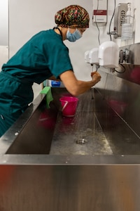 U.S. Air Force Lt. Col. Jessica Bolton, 96th Medical Group ophthalmologist, scrubs in prior to performing ophthalmological procedures at the Georgetown Public Hospital Corporation in Georgetown, Guyana, March 18, 2026. During the Lesser Antilles Medical Assistance Team (LAMAT) 2026 mission, U.S. Air Force ophthalmology teams performed critical eye procedures alongside Ministry of Health providers, enhancing surgical readiness while improving vision outcomes and strengthening enduring partnerships. (U.S. Air Force photo by Maj. Stephani Schafer)