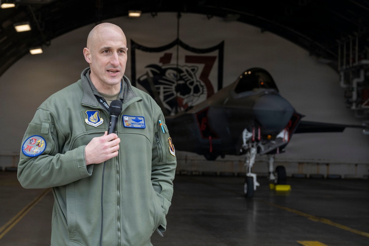 U.S. Air Force Col. Jeremy Guinther, 35th Operations Group commander, delivers a speech in front of a U.S. Air Force F-35A Lightning II during the F-35 first aircraft arrival at Misawa Air Base, Japan, March 28, 2026.