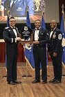 Airman receiving award
