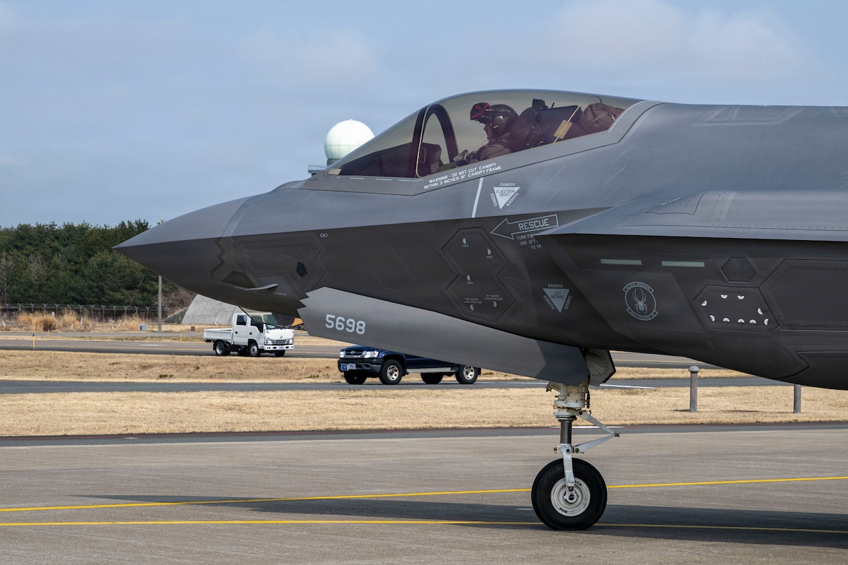 A U.S. Air Force F-35A Lightning II assigned to the 13th Fighter Squadron taxis out of a hangar during the F-35 first aircraft arrival at Misawa Air Base, Japan, March 28, 2026.