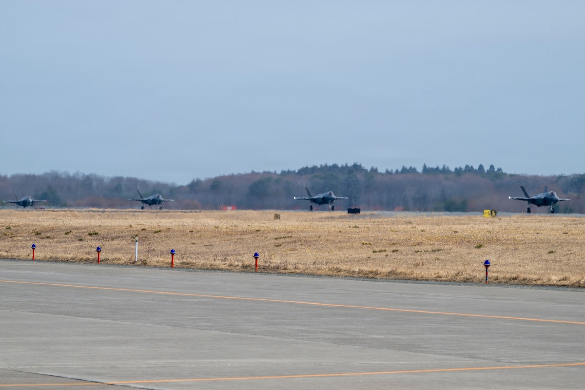Four U.S. Air Force F-35A Lightning II aircraft taxi on the runway during the F-35 first aircraft arrival at Misawa Air Base, Japan, March 28, 2026.