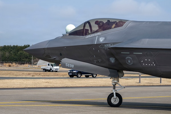 A U.S. Air Force F-35A Lightning II assigned to the 13th Fighter Squadron taxis out of a hangar during the F-35 first aircraft arrival at Misawa Air Base, Japan, March 28, 2026.