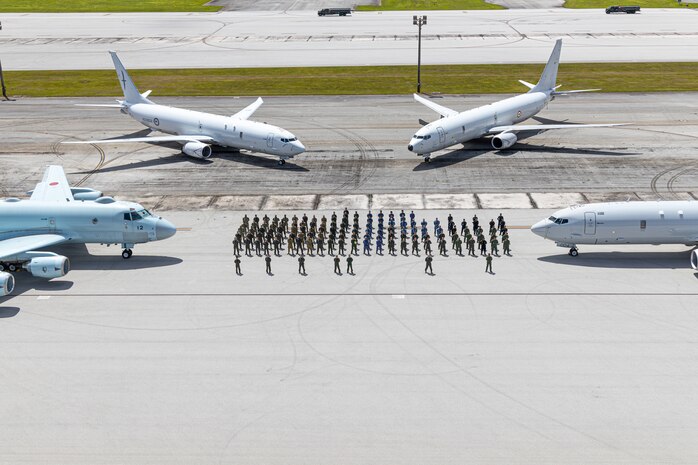 Sea Dragon anti-submarine warfare (ASW) competition participants pose for a group photo at Andersen Air Force Base, Guam, March 18, 2026.