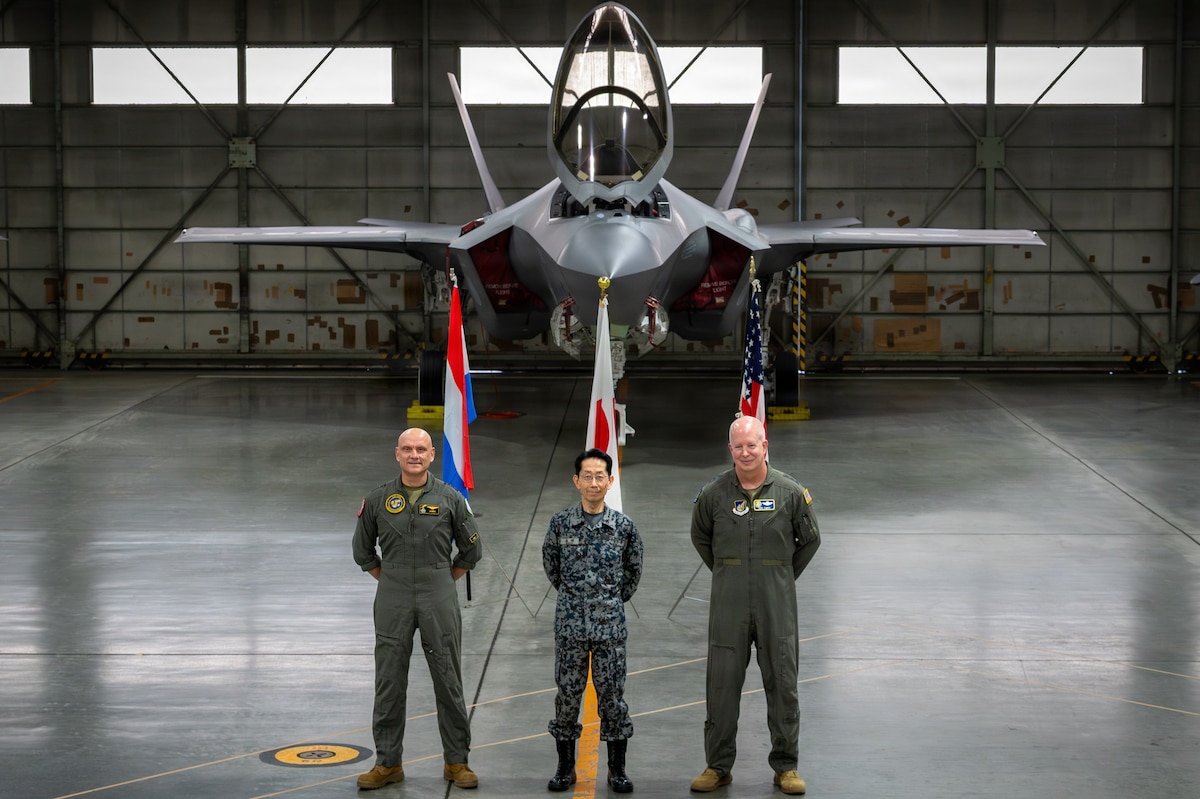 U.S. Air Force Lt. Gen. Joel Carey, right,  Fifth Air Force commander, Japan Air Self-Defense Forces Gen. Takehiro Morita, middle, Chief of Staff, and Royal Netherlands Air and Space Force Lt. Gen. André Steur, commander, pose for a photo in front of a F-35A Lightning II during Exercise Kazaguruma Guardian 26 (KG26) trilateral exercise at Misawa Air Base, Japan, March 27, 2026.