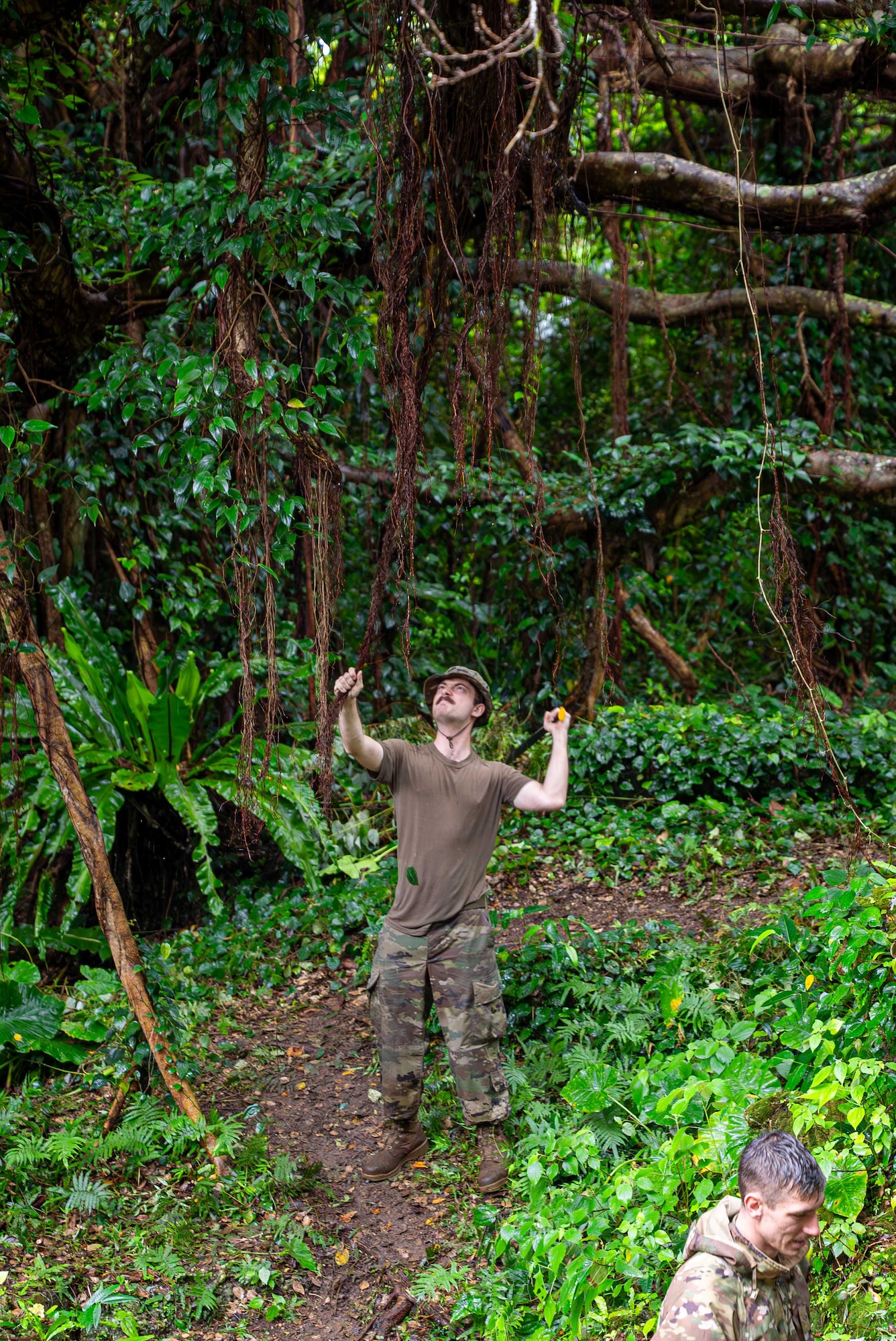 U.S. Air Force Airmen assigned to the 18th Munitions Squadron prepare to depart after a tomb clean-up in preparation for Shimi at Kadena Air Base, Japan, March 25, 2026.