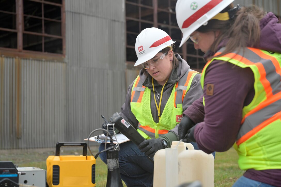 USACE health physicists, including Jessica Lauda, pictured right, conduct groundwater sampling in Andrews, Texas.