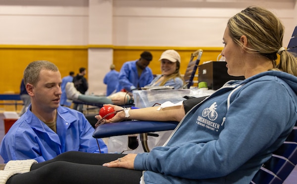YOKOSUKA, Japan (Feb. 25, 2026) — A donor gives blood while a laboratory technician monitors the collection process during a blood drive at Yokosuka’s Fleet Recreation Gym. U.S. Naval Hospital (USNH) Yokosuka, in partnership with the Armed Services Blood Bank Center (ASBBC) Okinawa, hosted a two-day blood drive at Commander, Fleet Activities Yokosuka’s Fleet Recreation Gym, Feb. 25–26, collecting 179 units of whole blood in support of operational readiness across the Indo-Pacific region. (U.S. Navy photo by Daniel Taylor/USNMRTC Yokosuka Public Affairs)