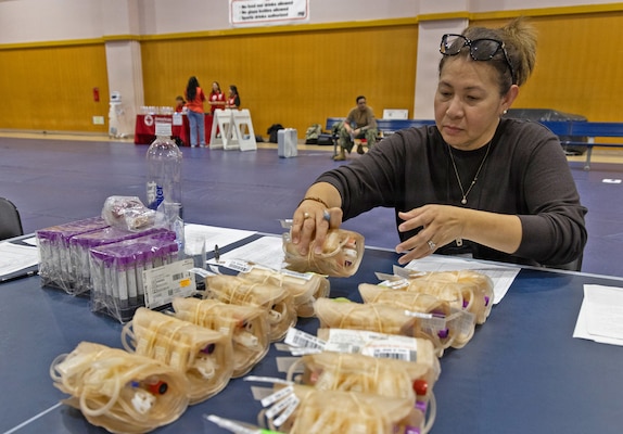 YOKOSUKA, Japan (Feb. 25, 2026) — Donor records go through final verification before blood collection bags are issued during a blood drive at Yokosuka’s Fleet Recreation Gym. U.S. Naval Hospital (USNH) Yokosuka, in partnership with the Armed Services Blood Bank Center (ASBBC) Okinawa, hosted a two-day blood drive at Commander, Fleet Activities Yokosuka’s Fleet Recreation Gym, Feb. 25–26, collecting 179 units of whole blood in support of operational readiness across the Indo-Pacific region. (U.S. Navy photo by Daniel Taylor/USNMRTC Yokosuka Public Affairs)