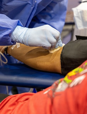 YOKOSUKA, Japan (Feb. 25, 2026) — Laboratory personnel from U.S. Naval Hospital Yokosuka and the Armed Services Blood Bank Center Okinawa prepare a donor for blood collection during a blood drive at Yokosuka’s Fleet Recreation Gym. U.S. Naval Hospital (USNH) Yokosuka, in partnership with the Armed Services Blood Bank Center (ASBBC) Okinawa, hosted a two-day blood drive at Commander, Fleet Activities Yokosuka’s Fleet Recreation Gym, Feb. 25–26, collecting 179 units of whole blood in support of operational readiness across the Indo-Pacific region. (U.S. Navy photo by Daniel Taylor/USNMRTC Yokosuka Public Affairs)