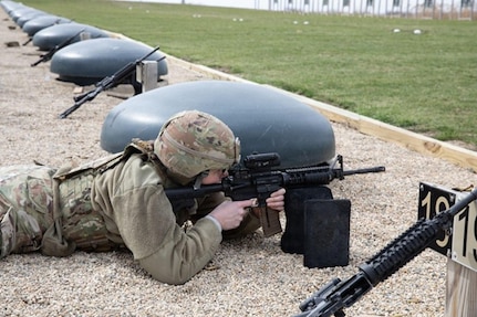 Illinois Army National Guard Soldier Staff Sgt. Jensyn Morrison of the Company A, 634 Brigade Support Battalion, 33rd Infantry Brigade fires at targets at a zeroing range at the Army National Guard training center in Marseilles, Illinois March 24, 2026.