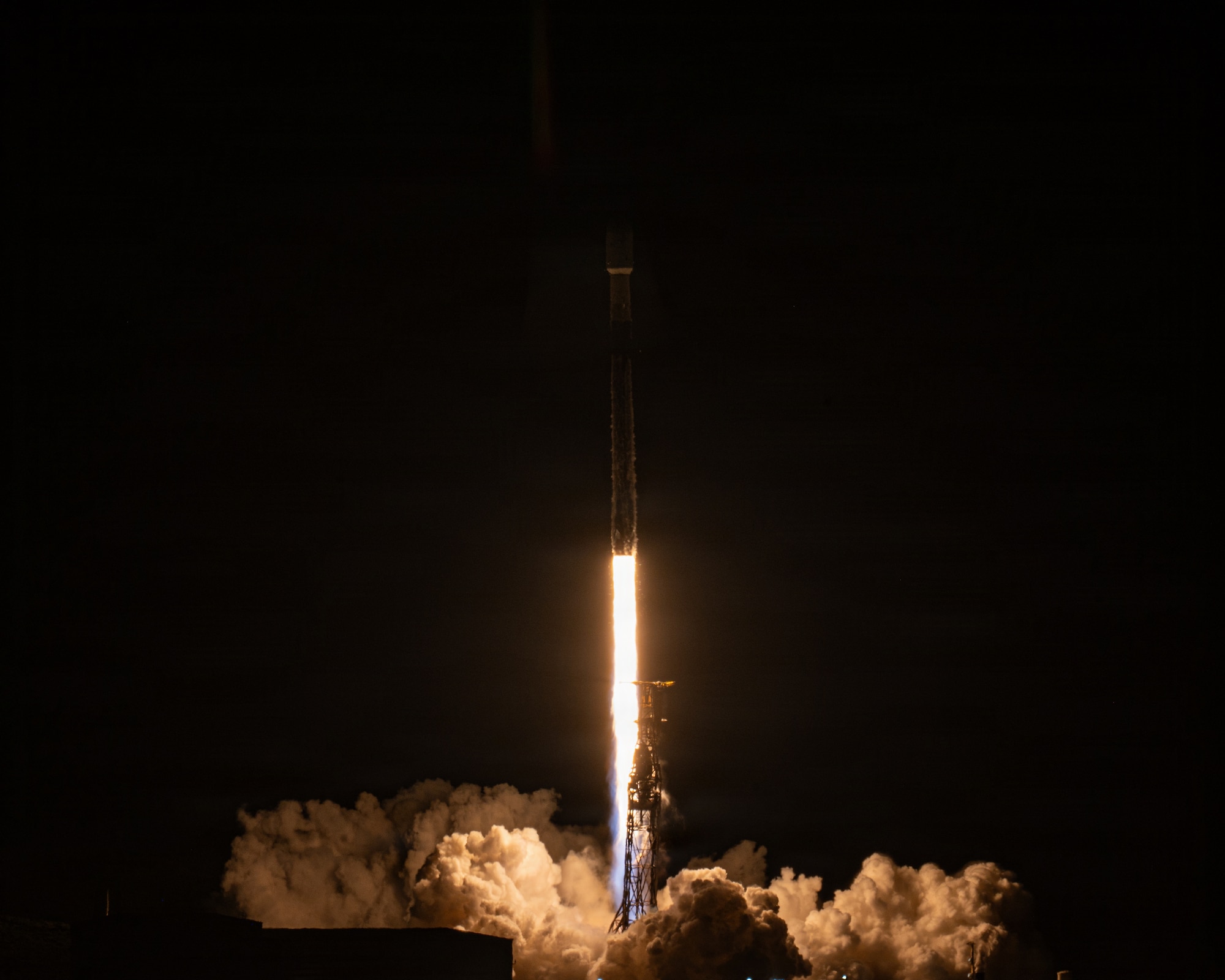 A SpaceX Falcon 9 Booster launches from the Space Launch Complex 4 East launch pad at Vandenberg SFB, California.