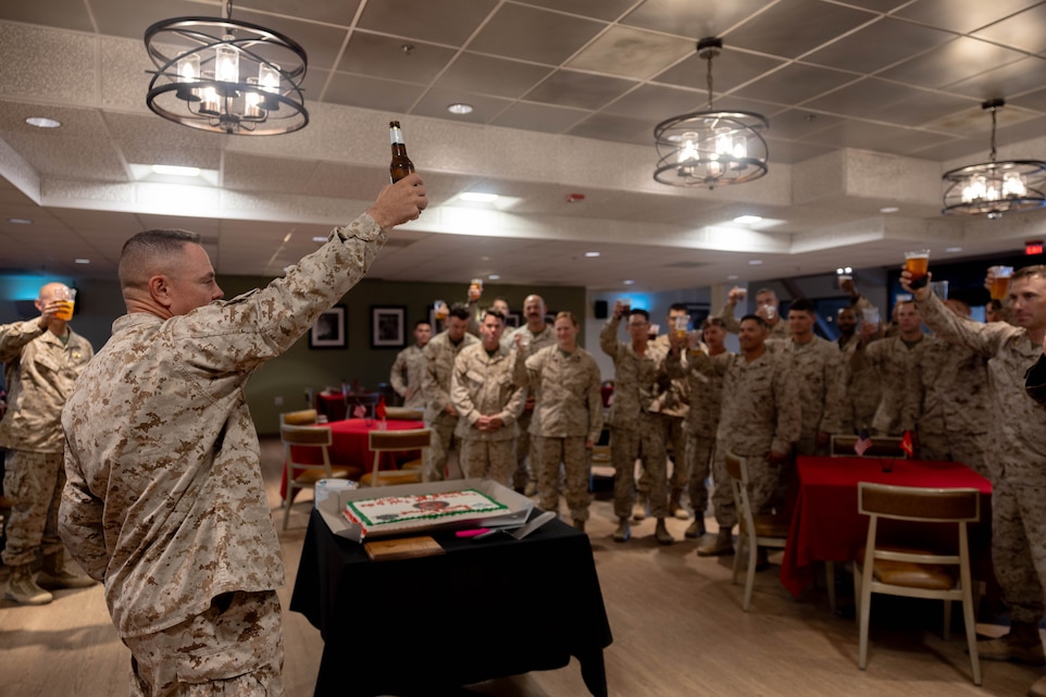 U.S. Marine Corps Col. Neil Berry, a Virginia native, commanding officer of 6th Marine Regiment, 2nd Marine Division, makes a toast during Warrior’s Night at Marine Corps Air Ground Combat Center, Twentynine Palms, California, Aug. 26, 2025. Warrior’s Night builds comradery and cohesion between units after a Service Level Training Exercise. (U.S. Marine Corps photo by Lance Cpl. Virginia Williams)