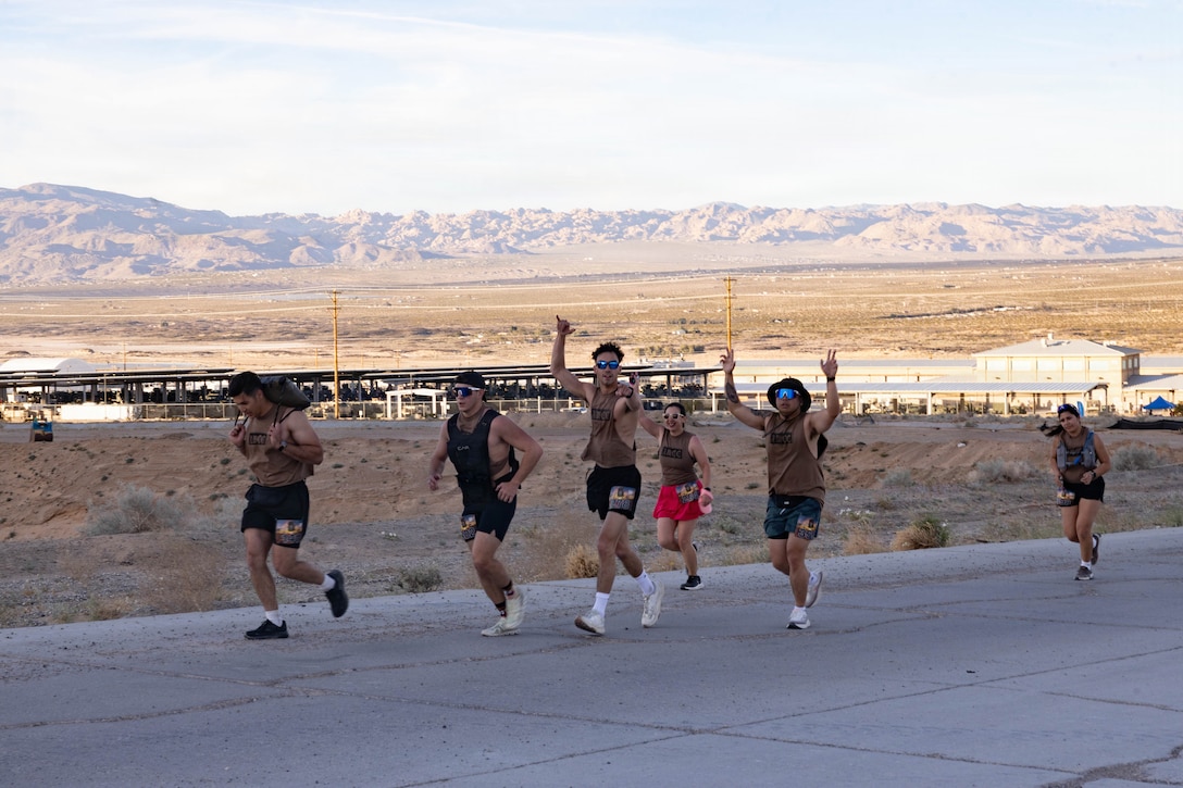 Participant in the Mojave Half Marathon run at Marine Corps Air Ground Combat Center, Twentynine Palms, California, Mar. 14, 2026. The Mojave Half Marathon marked the first ever 13.1-mile race aboard the installation, it challenged runners to improve their physical fitness as they ran through the desert, while encouraging camaraderie within the community of MCAGCC. (U.S. Marine Corps photo by Lance Cpl. Cody Fitzgerald)