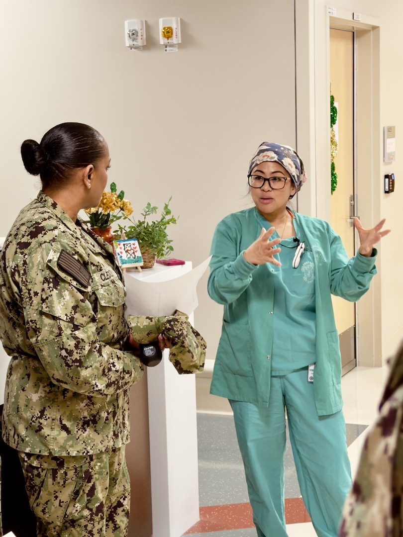 Staff discuss surgical capabilities and cross training opportunities.