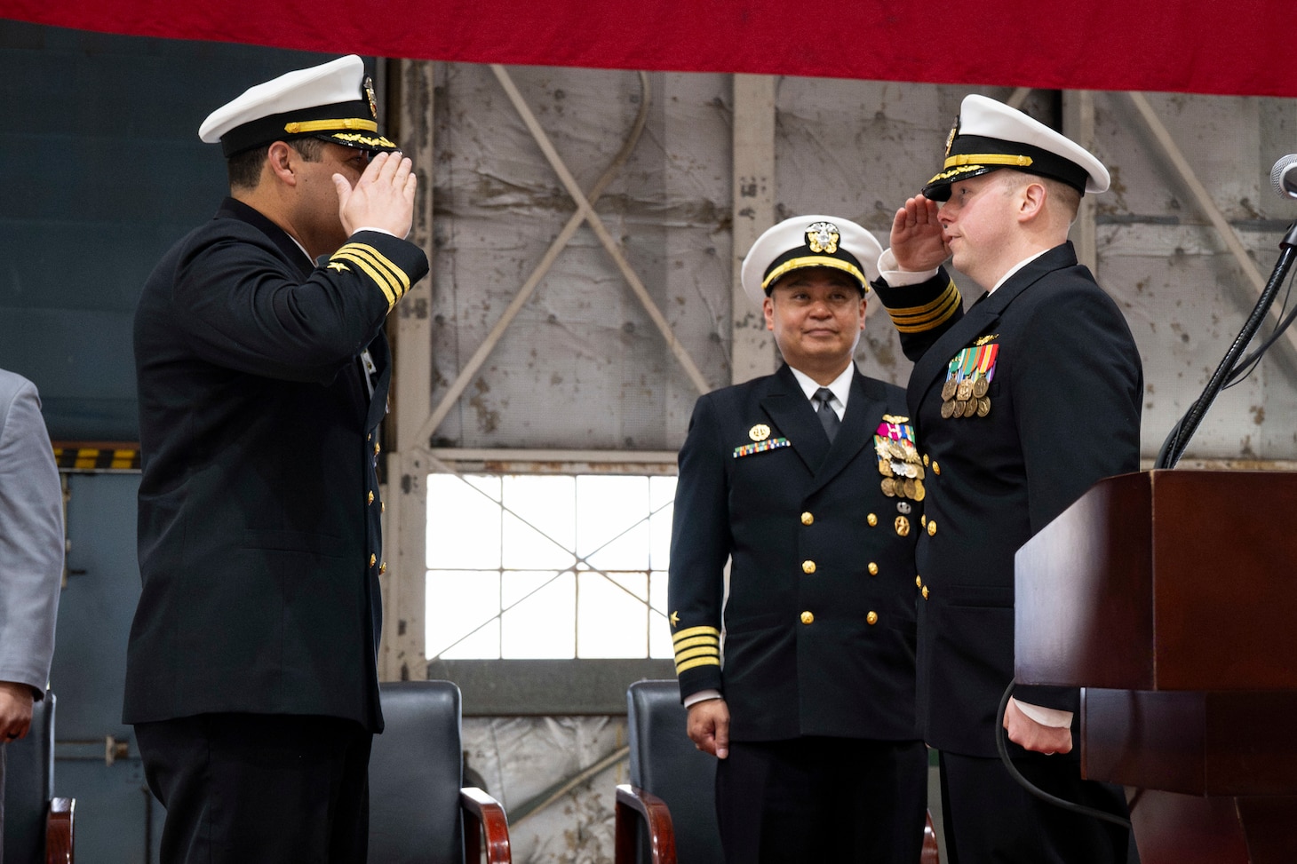 Cmdr. Luis Levine (left) is relieved as the U.S. Naval Research Laboratory Scientific Development Squadron ONE (VXS) 1 commanding officer by Cmdr. Andrew Vawter (right) during a change of command ceremony at Naval Air Station Patuxent River in Patuxent River, Md. March 27, 2026. (U.S. Navy photo by Sarah Peterson)