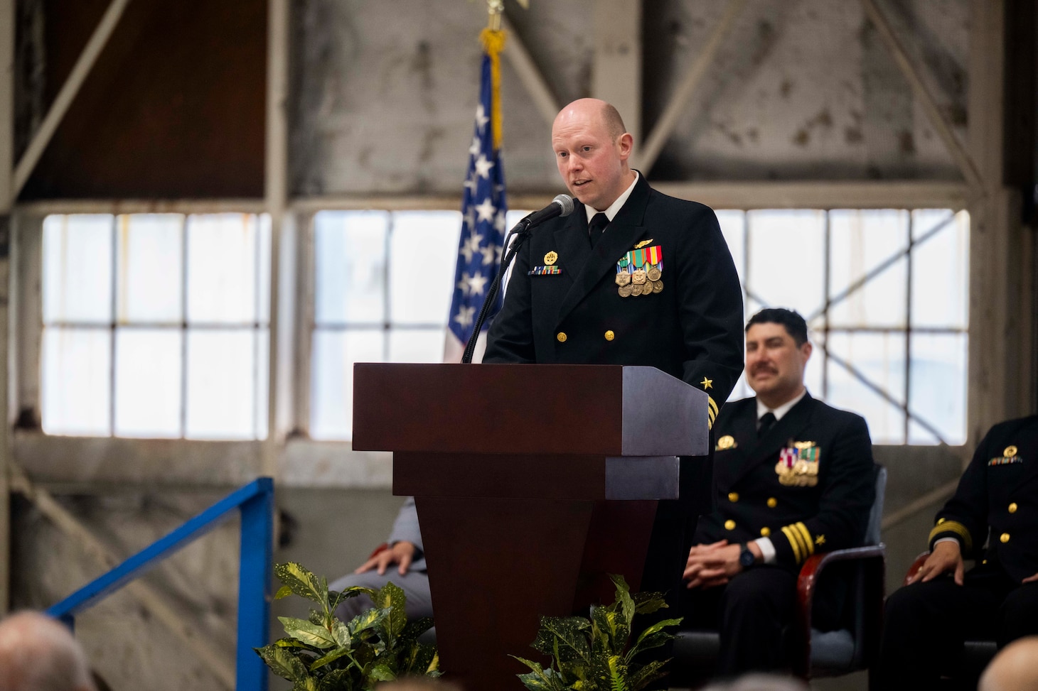 Cmdr. Andrew Vawter, U.S. Naval Research Laboratory Scientific Development Squadron ONE (VXS) 1 commanding officer, gives his welcoming remarks during the VXS-1 change of command ceremony at Naval Air Station Patuxent River in Patuxent River, Md. March 27, 2026. (U.S. Navy photo by Sarah Peterson)