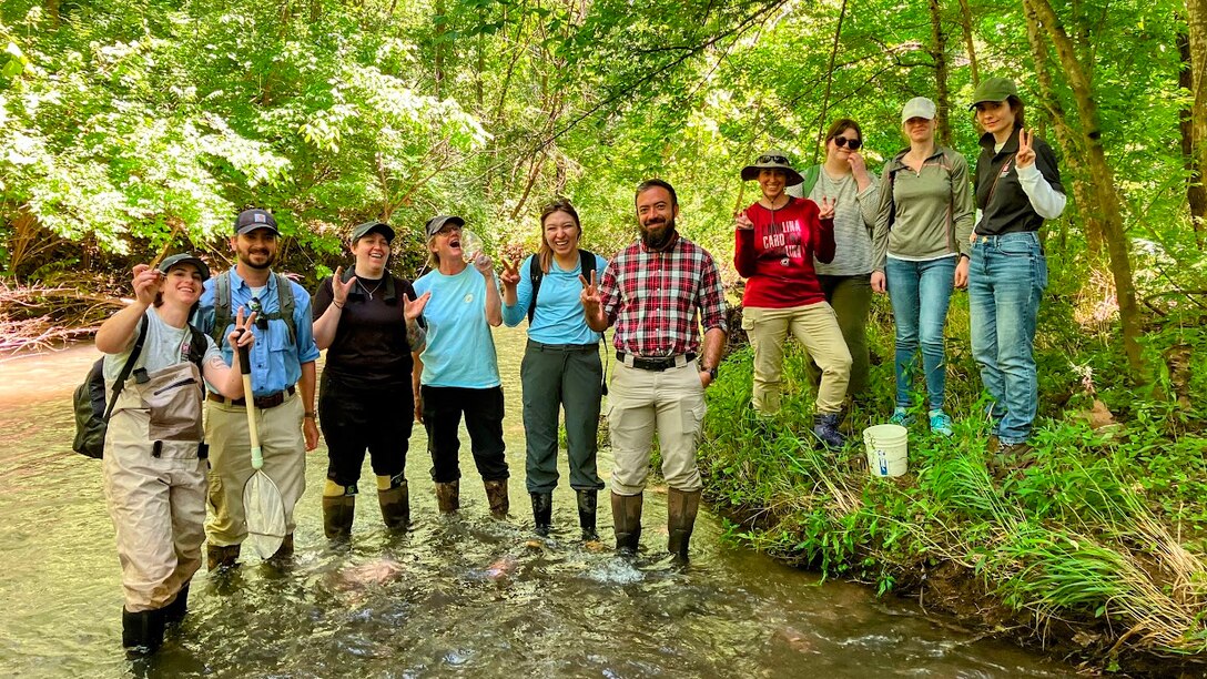 U.S. Army Corps of Engineers Nashville District staff, including assistant district counsel Kathryn Morris (far right) and summer externs Katie Coleman and Anna Kjems, attend a state-sponsored site visit in May 2024. The visit provided training on the identification of protected crayfish and the preservation of their habitat.