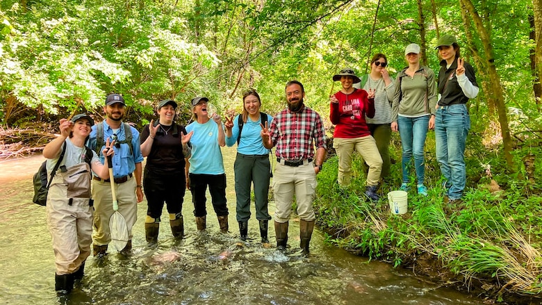 U.S. Army Corps of Engineers Nashville District staff, including assistant district counsel Kathryn Morris (far right) and summer externs Katie Coleman and Anna Kjems, attend a state-sponsored site visit in May 2024. The visit provided training on the identification of protected crayfish and the preservation of their habitat.