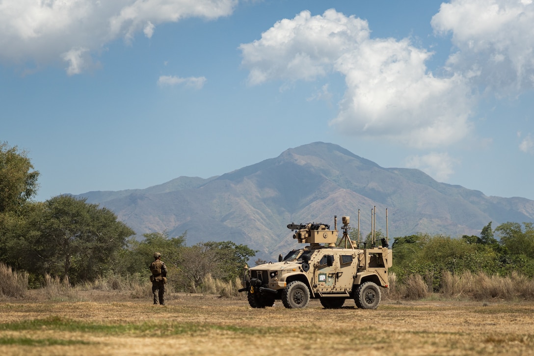 A U.S. Marine with 3d Littoral Anti-Air Battalion, 3d Marine Littoral Regiment, 3d Marine Division, ground guides a Marine Air Defense Integrated System prior to the commencement of Exercise Balikatan 25 at Naval Station Leovigildo Gantioqui, Philippines, April 19, 2025.
