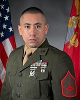 Gunnery Sergeant Andrew S. Cortez, Senior Enlisted Leader,
Marine Transport Squadron Andrews
