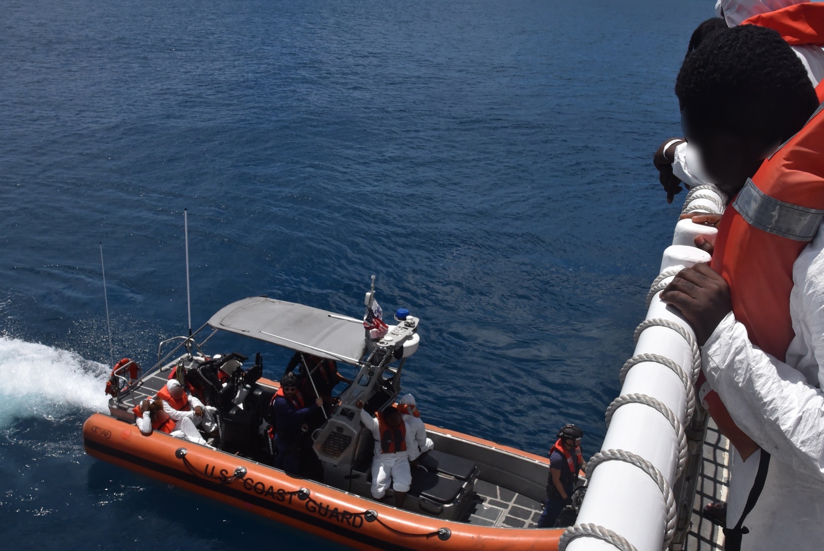 Coast Guard Cutter Thetis crewmembers repatriate 60 migrants to Santo Domingo, Dominican Republic, March 30, 2026.  The Thetis and a Customs and Border Protection aircrew interdicted an unlawful migration voyage vessel transporting 54 Haitians and six Dominican Republic nationals in Mona Passage waters off Puerto Rico, March 27, 2026. (U.S. Coast Guard photo)