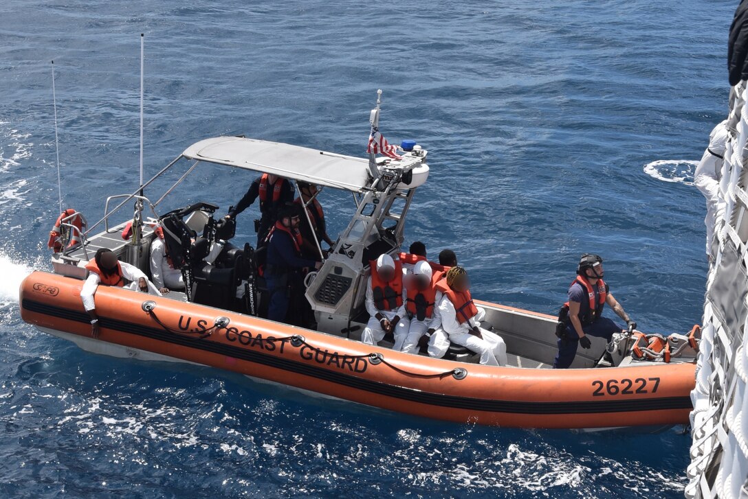 Coast Guard Cutter Thetis crewmembers repatriate 60 migrants to Santo Domingo, Dominican Republic, March 30, 2026.  The Thetis and a Customs and Border Protection aircrew interdicted an unlawful migration voyage vessel transporting 54 Haitians and six Dominican Republic nationals in Mona Passage waters off Puerto Rico, March 27, 2026. (U.S. Coast Guard photo)