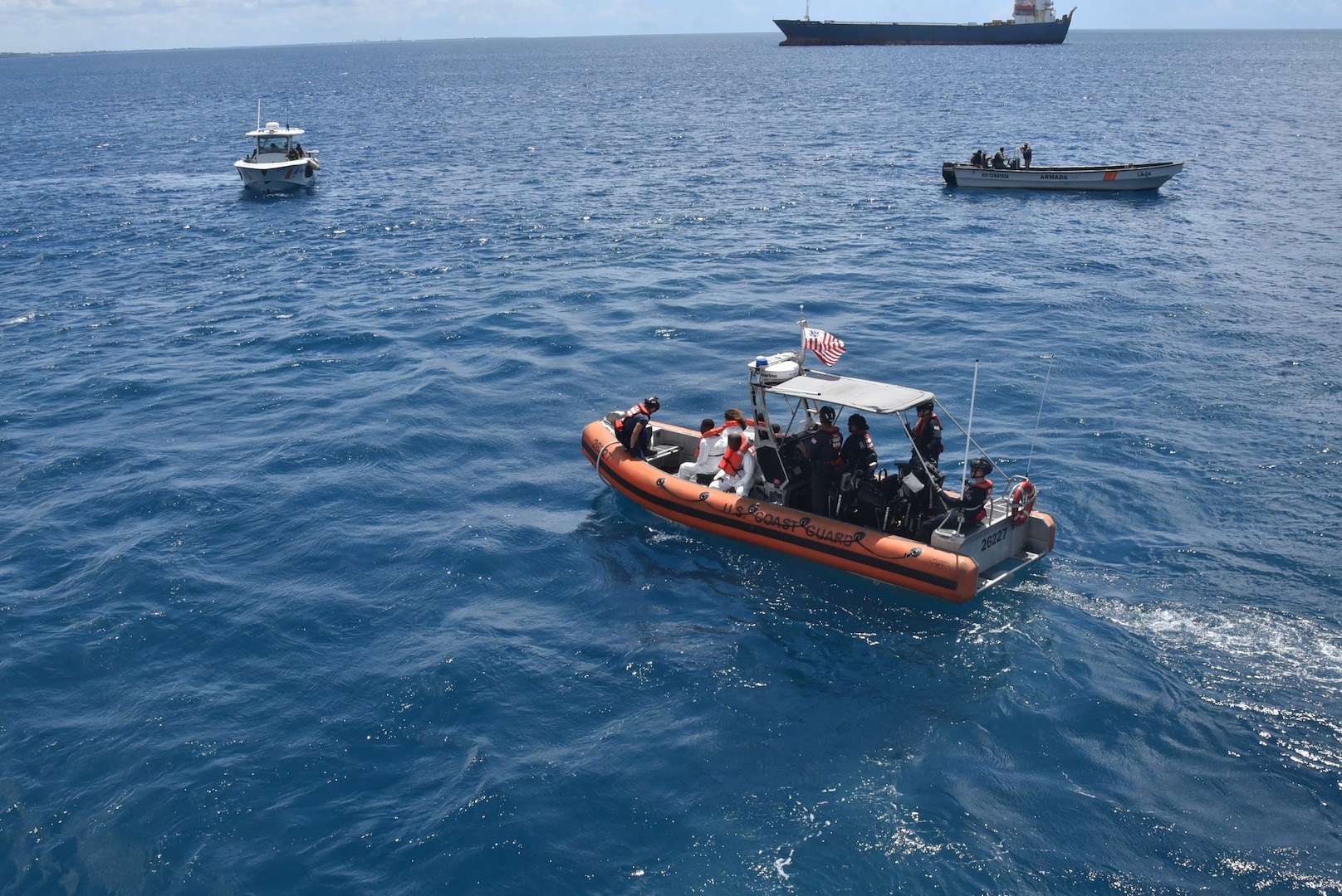 Coast Guard Cutter Thetis crewmembers repatriate 60 migrants to Santo Domingo, Dominican Republic, March 30, 2026.  The Thetis and a Customs and Border Protection aircrew interdicted an unlawful migration voyage vessel transporting 54 Haitians and six Dominican Republic nationals in Mona Passage waters off Puerto Rico, March 27, 2026. (U.S. Coast Guard photo)