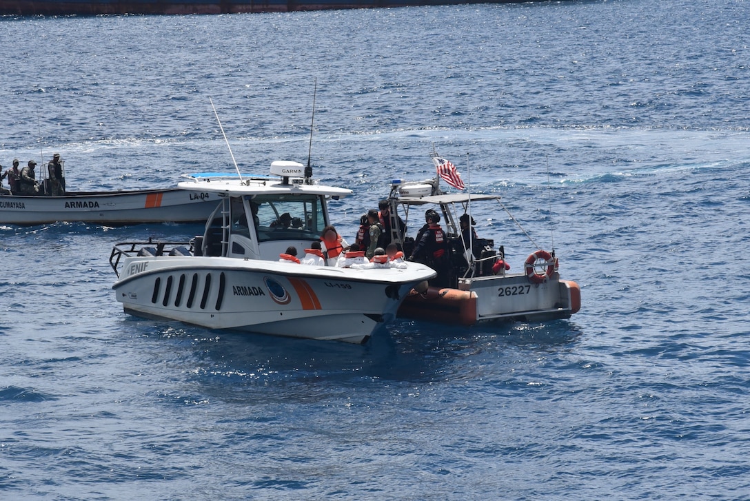 Coast Guard Cutter Thetis crewmembers repatriate 60 migrants to Santo Domingo, Dominican Republic, March 30, 2026.  The Thetis and a Customs and Border Protection aircrew interdicted an unlawful migration voyage vessel transporting 54 Haitians and six Dominican Republic nationals in Mona Passage waters off Puerto Rico, March 27, 2026. (U.S. Coast Guard photo)